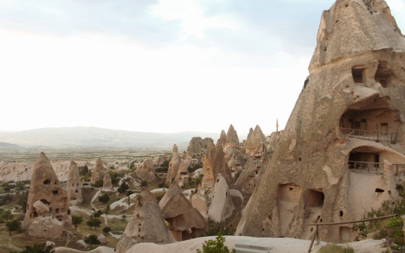 Discover the unique rock formations of Cappadocia, Turkey, shaped by erosion.