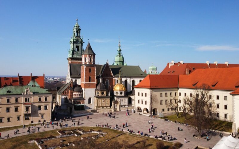A stunning daytime view of Wawel Cathedral and courtyard in Kraków, Poland.