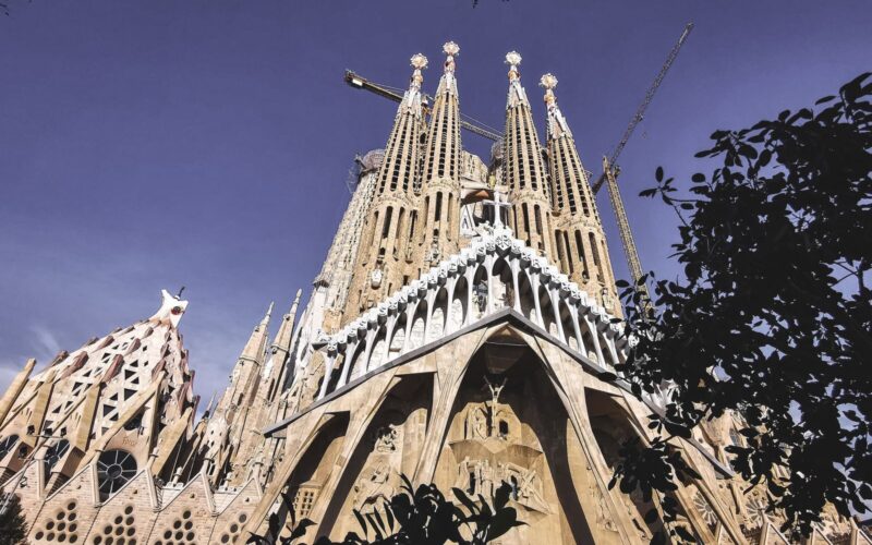 Stunning view of La Sagrada Familia's intricate facade and spires in Barcelona.